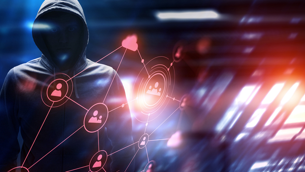 Protection and cybersecurity in an age of hacking - man in hoodie